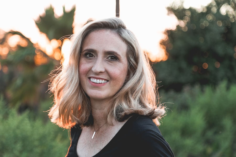 A person smiling in natural light